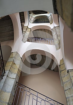 Interior courtyard stairs and arches, Hotel Iris