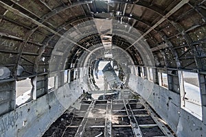 Interior of crashed military plane wreck at black sand beach in Solheimasandur