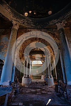 Interior of dark creepy abandoned church. Old rotunda