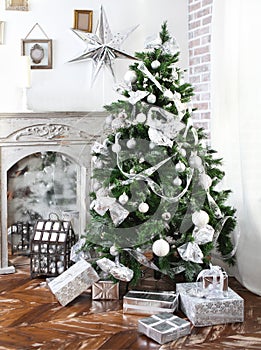 Daily interior decked out with Christmas tree and fireplace