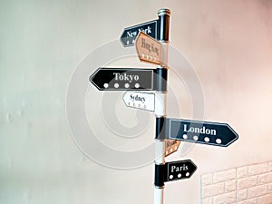 The interior decoration of the hotel lobby is in the form of a world city signpost.