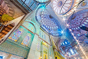 Interior decoration view and artworks of Blue Mosque also called Sultan Ahmed Mosque.Ceiling and domes decorations.ISTANBUL,