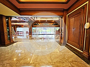 Interior decoration of vintage hotel hallway, Hotel reception area, Side entry photo