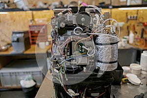 The interior of a defective espressomachine, ready to be repaired.