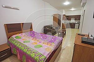 Interior design of bedroom in studio apartment