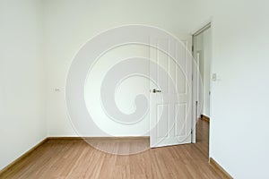 Interior design and building concept for white room and parquet flooring.