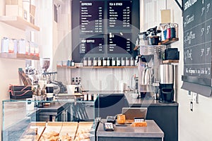 Interior design details of empty modern coffee shop restaurant at daytime. Small local business. photo