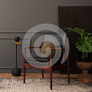 Interior design of elegant living room interior with copy space, leather armchair, plant, round pillows, gray rug, black wall with