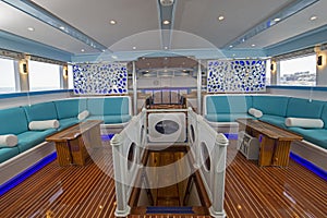 Interior design of large salon area on luxury motor yacht