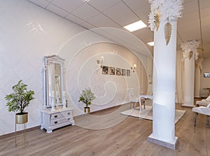 Interior design of a luxurious venue for bridal gowns