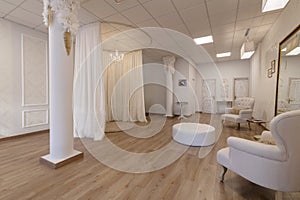 Interior design of a luxurious venue for bridal gowns