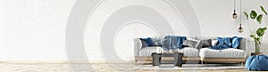 Interior design of modern living room panorama. White sofa over the brick wall with copy space. Home interior background. 3d