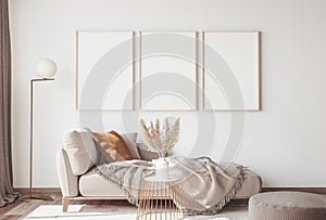 Interior design of modern Scandinavian apartment, three empty frames . neutral colors,