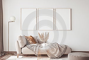 Interior design of modern Scandinavian apartment, three empty frames . neutral colors, photo