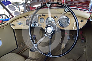 Interior design of Morris Garage old classic sports car in beige colour