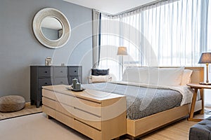 Interior design of villa, house, home, condo and apartment feature bedroom, king size bed, and grey wall