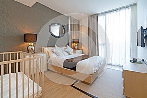 Interior design in villa, house, home, condo and apartment feature king size bed in modern bedroom