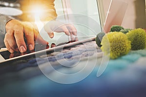 Interior designer hand choosing carpet sample