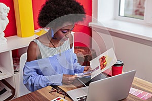 Interior designer working hard choosing color for sofa in living room