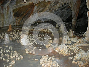 Interior detail of stalactites and stalagmites of the Toirano caves photo