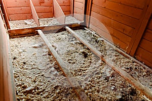 Interior of a dirty empty chicken coop