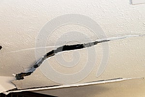 Interior drywall damage to ceiling