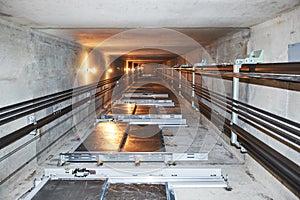 Elevator in lift shaft photo