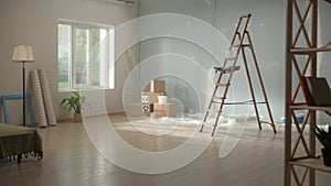 Interior of an empty apartment during renovation. A stepladder, stacks of cardboard boxes on the floor, rolls of