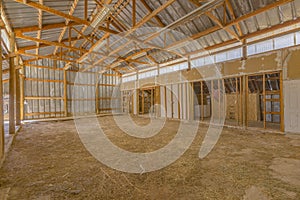 Interior of empty barn wooden beams