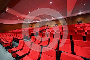 Interior of empty hall with arm-chairs