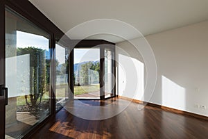 Interior of empty modern apartment, parquet floor photo