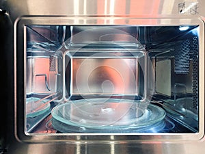 Interior of an empty modern microwave oven