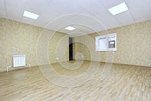 Interior empty office light room with green wallpaper unfurnished in a new building