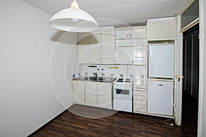 Interior of empty old kitchen in an apartment studio