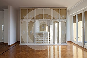 Interior, empty room with a period closet photo