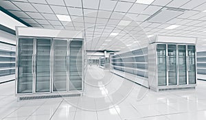 Interior empty supermarket with showcases freezer.