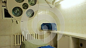 Interior of empty surgery room and medical equipment in hospital.