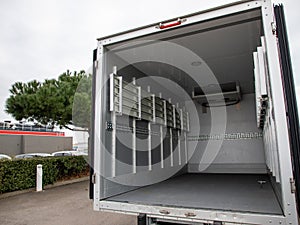 interior of an empty truck with both doors open gray empty place small vehicle