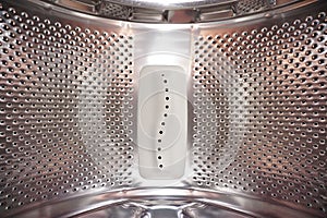 Interior of an empty washing machine drum
