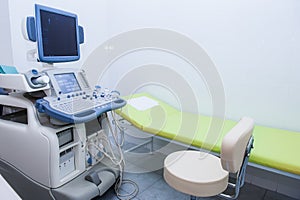 Interior of examination room with ultrasonography machine in hospital. Selective focus