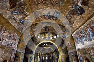 Interior of famous San Marco or St Mark`s Basilica, it is great old landmark of Venice. Beautiful wall mosaic