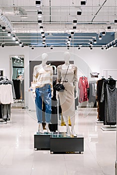 Interior of a fashion and designer clothing store.