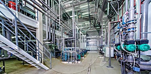 Interior gas boiler room with multiple pipelines