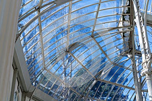 Interior of greenhouse. Crystal Palace Palacio de cristal in the Retiro Park in Madrid. Spain. It was built in 1887. The