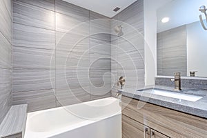 Interior of grey modern bathroom