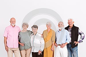 interior with group of senior happy people in casual cloths