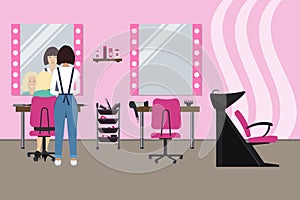 Interior of a hairdressing salon in a pink color. Beauty salon