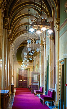 Interior halls and rooms of Parliament House in Budapest, Hungary are painted and decorated with gold leaf. photo