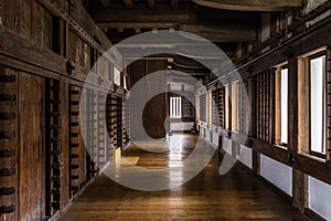 Interior of the Himeji Castle with the weapon racks on the wall in Hyogo, Japan