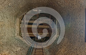 The interior of a historic brick water tower.